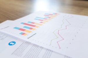 Statistics graphs on paper on a table.