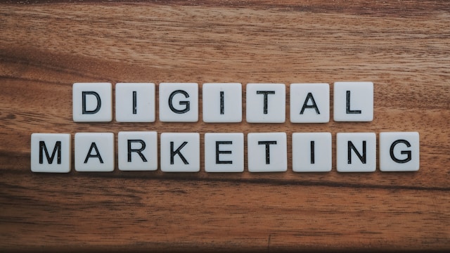 diggity-marketing-SB0WARG16HI-unsplash - GeoPlugin - Resources The words “Digital Marketing” made out of tiles on a wooden background.