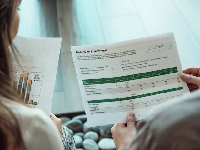 pexels-kindelmedia-7651559 - GeoPlugin - Resources Image showing a sheet that shows the improvement in return on investment.